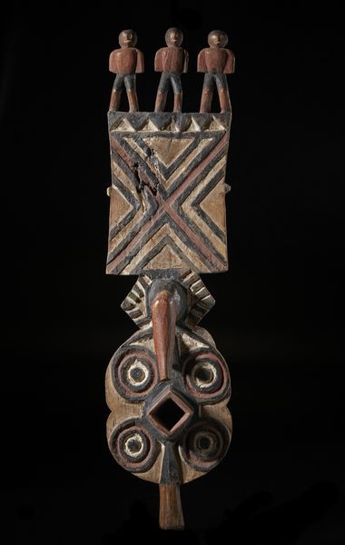 Bwa - Mali/Burkina Faso : Maschera zoomorfa con decori geometrici e tre figure antropomorfe nella parte sommitale. Legno duro e pigmenti.  - Asta Asta 422 | AFRICA, OCEANIA E AMERICHE - ARTIGIANATO AFRICANO: VARI COMMITTENTI E SELEZIONE DALLA COLLEZIONE BARTOLOMUCCI Online - Associazione Nazionale - Case d'Asta italiane