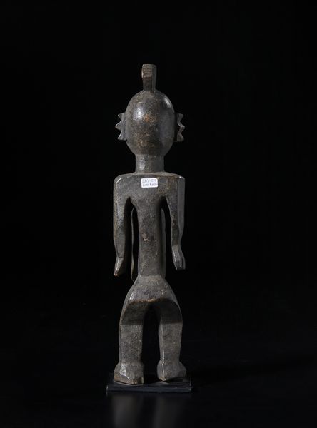 Koro - Nigeria : Scultura-reliquiario  antropomorfa con grande cavit addominale.Legno duro a patina scura crostosa.  - Asta Asta 422 | AFRICA, OCEANIA E AMERICHE - ARTIGIANATO AFRICANO: VARI COMMITTENTI E SELEZIONE DALLA COLLEZIONE BARTOLOMUCCI Online - Associazione Nazionale - Case d'Asta italiane