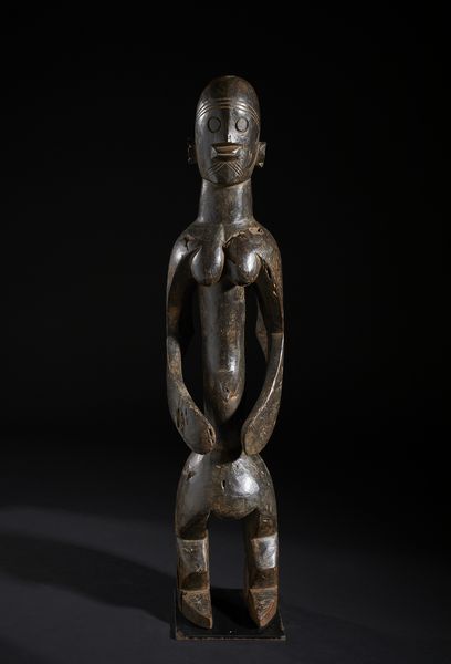 Mumuye - Nigeria/Camerun : Scultura antropomorfa stilizzata. Legno a patina scura.  - Asta Asta 422 | AFRICA, OCEANIA E AMERICHE - ARTIGIANATO AFRICANO: VARI COMMITTENTI E SELEZIONE DALLA COLLEZIONE BARTOLOMUCCI Online - Associazione Nazionale - Case d'Asta italiane