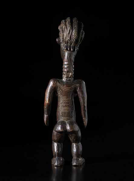 Bassa - Libera/Sierra Leone : Scultura antropomorfa.Legno a patina scura e pigmenti.  - Asta Asta 422 | AFRICA, OCEANIA E AMERICHE - ARTIGIANATO AFRICANO: VARI COMMITTENTI E SELEZIONE DALLA COLLEZIONE BARTOLOMUCCI Online - Associazione Nazionale - Case d'Asta italiane