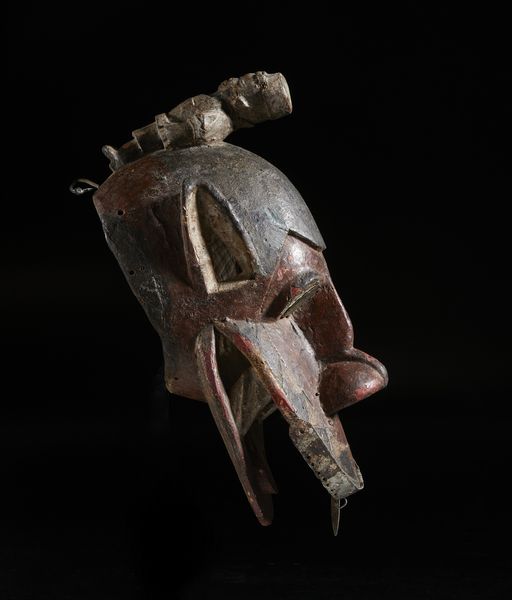 Baule - Costa d'Avorio : Maschera zoomorfa con figura antropomorfa.Legno, pigmenti e metallo.  - Asta Asta 422 | AFRICA, OCEANIA E AMERICHE - ARTIGIANATO AFRICANO: VARI COMMITTENTI E SELEZIONE DALLA COLLEZIONE BARTOLOMUCCI Online - Associazione Nazionale - Case d'Asta italiane