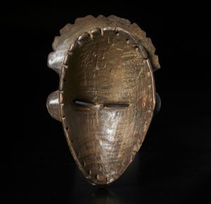 Dan - Costa d'Avorio/Liberia : Maschera antropomorfa. Legno duro a  patina scura.  - Asta Asta 422 | AFRICA, OCEANIA E AMERICHE - ARTIGIANATO AFRICANO: VARI COMMITTENTI E SELEZIONE DALLA COLLEZIONE BARTOLOMUCCI Online - Associazione Nazionale - Case d'Asta italiane