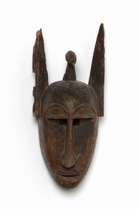 Bambara - Mali - Maschera antropozoomorfa.Legno a patina bruna.