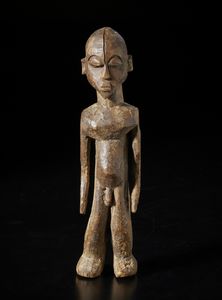 Lobi - Burkina Faso - Scultura antropomorfa Bateba.Legno duro a patina chiara.