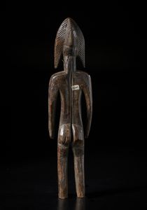 Bambara - Mali : Scultura antropomorfa.Legno duro a patina scura.  - Asta Asta 422 | AFRICA, OCEANIA E AMERICHE - ARTIGIANATO AFRICANO: VARI COMMITTENTI E SELEZIONE DALLA COLLEZIONE BARTOLOMUCCI Online - Associazione Nazionale - Case d'Asta italiane