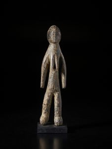 Mossi - Burkina Faso - Scultura antropomorfa. Legno duro a patina marrone.