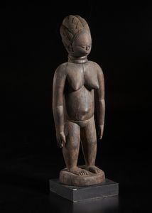 Mende - Sierra Leone - Scultura  antropomorfa femminile.Legno a patina bruna.