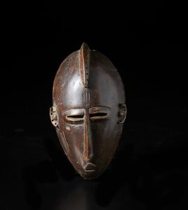 Mossi - Burkina Faso - Maschera antropomorfa. Legno con patina marrone.