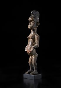 Igbo - Nigeria : Scultura antropomorfa. Legno a patina marrone, pigmenti.  - Asta Asta 422 | AFRICA, OCEANIA E AMERICHE - ARTIGIANATO AFRICANO: VARI COMMITTENTI E SELEZIONE DALLA COLLEZIONE BARTOLOMUCCI Online - Associazione Nazionale - Case d'Asta italiane