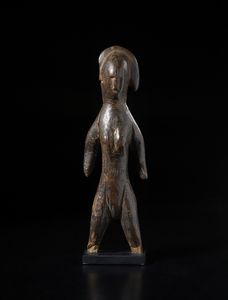 Bambara - Mali - Scultura  antropomorfa con mancanza. Legno a patina scura e marrone.