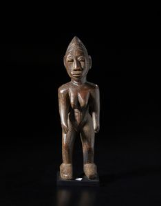 Mossi - Burkina Faso - Scultura antropomorfa. Legno duro a patina marrone.