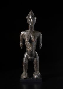 Mossi - Burkina Faso - Scultura antropomorfa femminile. Legno duro a patina scura.