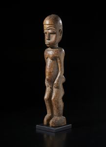 Lobi - Burkina Faso/Costa d'Avorio - Scultura antropomorfa Bateba. Legno duro a patina marrone.