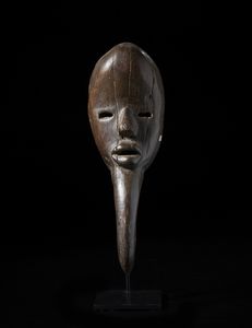 Dan - Costa d'Avorio/Liberia - Maschera antropozoomorfa Gagon. Legno duro a patina marrone.