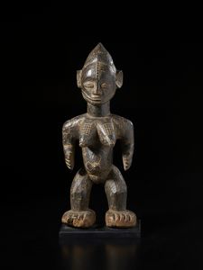 Yoruba -Nigeria - Scultura antropomorfa.Legno duro a patina scura.