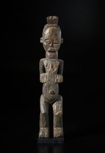 Urhobo, Nigeria - Scultura antropomorfa. Legno duro con patina scura.