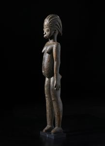 Lobi - Burkina Faso - Scultura antropomorfa Bateba.Legno duro a patina scura.