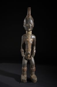 Igbo - Nigeria - Grande scultura antropomorfa. Legno duro a patina scura e pigmenti.