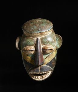 Baule - Costa d'Avorio : Maschera antropomorfa. Legno e pigmenti.  - Asta Asta 422 | AFRICA, OCEANIA E AMERICHE - ARTIGIANATO AFRICANO: VARI COMMITTENTI E SELEZIONE DALLA COLLEZIONE BARTOLOMUCCI Online - Associazione Nazionale - Case d'Asta italiane