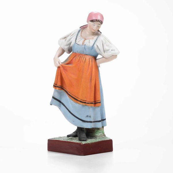 Figurina.<BR>Russia, Verbilki (Mosca), Manifattura Garder, fine del XIX - inizio del XX secolo.<BR>  - Asta Maioliche e Porcellane - Associazione Nazionale - Case d'Asta italiane