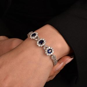 BRACCIALE FLOREALE CON ZAFFIRI E DIAMANTI  - Asta Gioielli  - Associazione Nazionale - Case d'Asta italiane