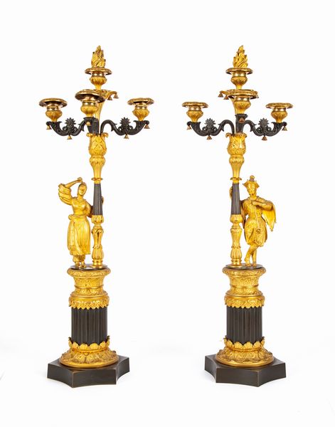 Coppia di candelabri in bronzo dorato e brunito d'epoca Impero a quattro luci  - Asta Antiquariato - Mobili, Sculture e Oggetti d'Arte - Associazione Nazionale - Case d'Asta italiane