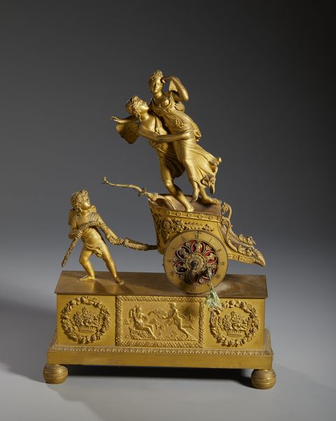 MANIFATTURA FRANCESE DEL XIX SECOLO : Pendola da tavolo in bronzo dorato con Amore e Psiche su un cocchio trainato da un putto, su base decorata a rilievo con festoni, canestre di fiori e scena mitologica  - Asta Asta 423 | ARTE ANTICA E DEL XIX SECOLO Online - Associazione Nazionale - Case d'Asta italiane