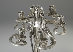 GAMBA ACHILLE (1881 - 1944) : Attribuito a. Coppia di candelabri Art Nouveau a sei fiamme in metallo argentato in forma di figure femminili  - Asta Asta 423 | ARTE ANTICA E DEL XIX SECOLO Online - Associazione Nazionale - Case d'Asta italiane