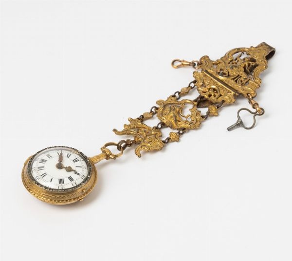 Orologio da tasca con chateleine associata in metallo dorato, firmato Jean daniel Bahn a Strasbourg, Luigi XVI del  1780-1790 circa, cassa in ottone dorata, scappamento a verga, smalto sul retro  - Asta Orologi da Tasca - Associazione Nazionale - Case d'Asta italiane