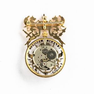 Orologio Broches in oro 18k, assemblata con componenti depoca ed una moneta messicana in oro ( periodo 1865 circa). <BR>Movimento a remontoir  Alfa a 17 rubini, di recente produzione ( 1970-1980 )  - Asta Orologi da Tasca - Associazione Nazionale - Case d'Asta italiane