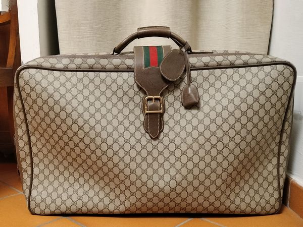 Gucci, Valigia morbida in tela monogram GG impermeabilizzata  - Asta Vintagemania - Associazione Nazionale - Case d'Asta italiane