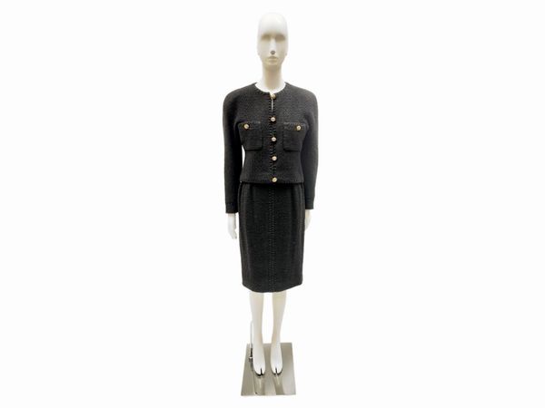 Chanel, Tailleur in tessuto di lana nera boucl  - Asta Vintagemania - Associazione Nazionale - Case d'Asta italiane