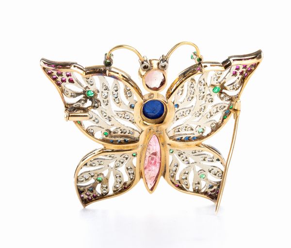 Spilla farfalla in oro con diamanti e pietre di colore  - Asta Gioielli, orologi, argenti e penne - Associazione Nazionale - Case d'Asta italiane