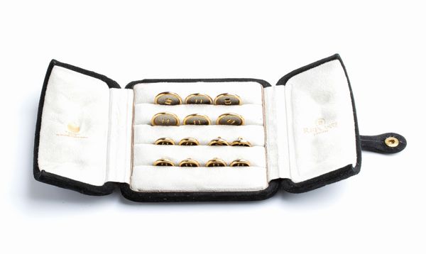 REPOSSI: set di 14 bottoni in acciaio ed oro  - Asta Gioielli, orologi, argenti e penne - Associazione Nazionale - Case d'Asta italiane