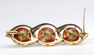 Spilla in oro con corallo e diamanti  - Asta Gioielli, orologi, argenti e penne - Associazione Nazionale - Case d'Asta italiane