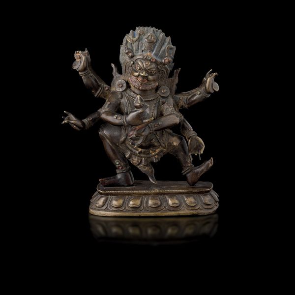 Figura di Mahakala in bronzo parzialmente dorato, Tibet, XVI secolo  - Asta Fine Chinese Works of Art - Associazione Nazionale - Case d'Asta italiane