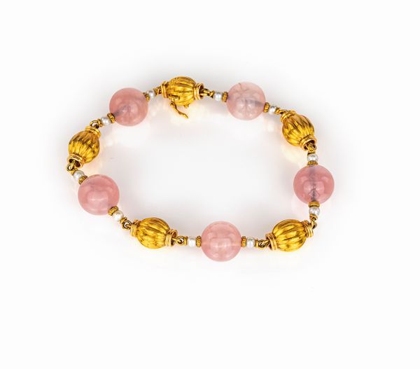 Bracciale in oro perle e quarzo rosa  - Asta Asta Gioielli e Orologi - Associazione Nazionale - Case d'Asta italiane