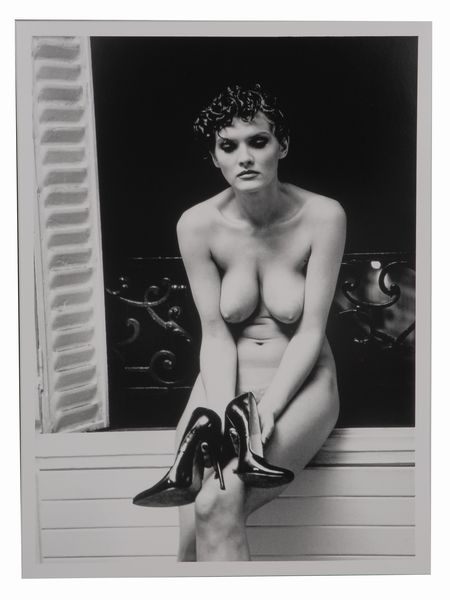 HELMUT NEWTON : Sylvia examining her high heeled shoes in my studio, Parigi, 1981  - Asta Asta di Arte Moderna e Contemporanea - Associazione Nazionale - Case d'Asta italiane