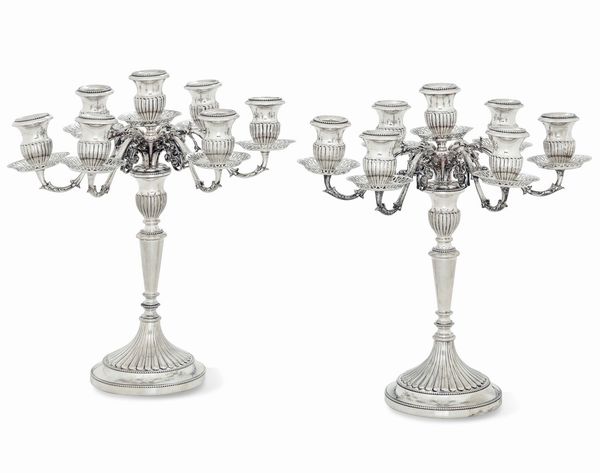 Coppia candelabri. Argenteria artistica italiana del XX secolo, Firenze (marchio dell'argentiere consunto)  - Asta L'Art de la Table - Associazione Nazionale - Case d'Asta italiane