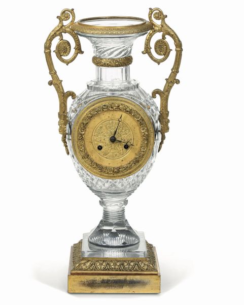 Orologio a vaso con cassa in cristallo e bronzo dorato. XIX secolo  - Asta Dimore Italiane - Associazione Nazionale - Case d'Asta italiane