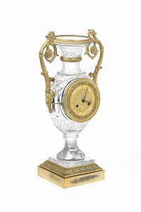 Orologio a vaso con cassa in cristallo e bronzo dorato. XIX secolo  - Asta Dimore Italiane - Associazione Nazionale - Case d'Asta italiane