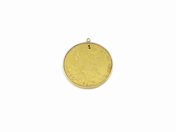 Pendente in oro giallo con moneta da 8 Scudi Carlo III di Spagna 1781  - Asta Gioielli e Orologi - Associazione Nazionale - Case d'Asta italiane
