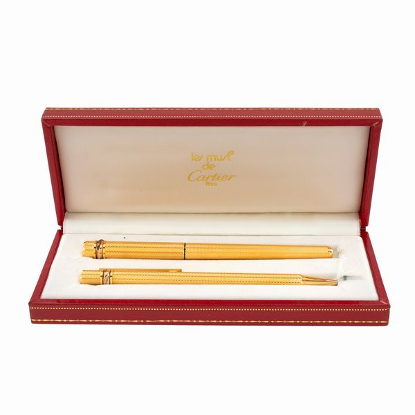 Cartier collezione Trilogy penna stilografica e penna portamine  - Asta Gioielli Orologi | Fashion Vintage - Associazione Nazionale - Case d'Asta italiane