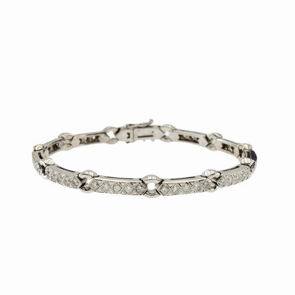 Bracciale segmenti in oro bianco 18kt e diamanti  - Asta Gioielli Orologi | Fashion Vintage - Associazione Nazionale - Case d'Asta italiane