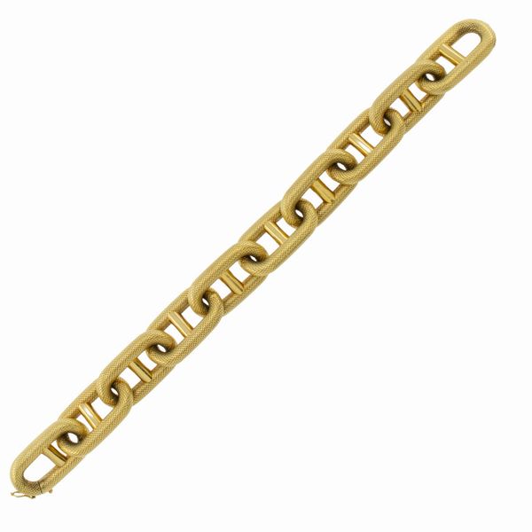 Bracciale in oro giallo 18kt martellato  - Asta Gioielli Orologi | Fashion Vintage - Associazione Nazionale - Case d'Asta italiane