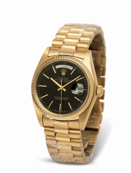 ROLEX : Daydate ref 18038 in oro giallo 18k, quadrante nero con indici applicati, indicazione di giorno e data, bracciale President con chiusura a scomparsa, movimento automatico  - Asta Orologi da Polso - Associazione Nazionale - Case d'Asta italiane