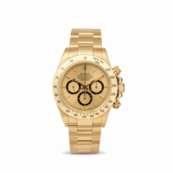 ROLEX : Iconico e ricercato Cosmograph Daytona ref 16528 in oro giallo 18k, quadrante champagne con contatori neri, lunetta tachimetrica e tasti a vite, bracciale Oyster  - Asta Orologi da Polso - Associazione Nazionale - Case d'Asta italiane