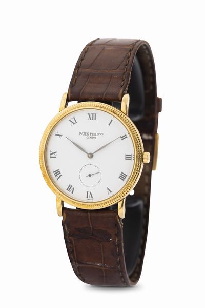 PATEK PHILIPPE : Fine ed elegante, Calatrava Clos de Paris da polso a carica manuale in oro giallo 18 kt, referenza 3919, corredato da scatola e garanzia  - Asta Orologi da Polso - Associazione Nazionale - Case d'Asta italiane