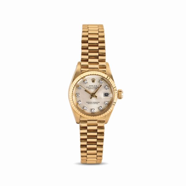 ROLEX : Affascinante e raffinato Datejust Lady ref 6917, in oro giallo 18k, bracciale President, quadrante Argent con indici in brillanti  - Asta Orologi da Polso - Associazione Nazionale - Case d'Asta italiane