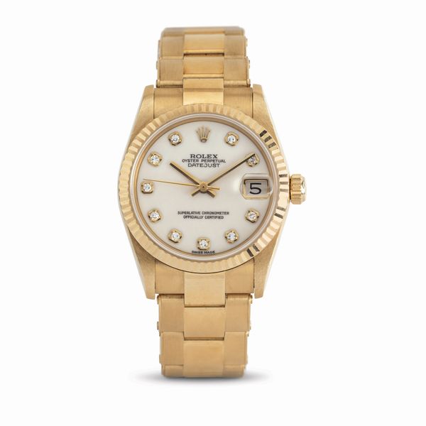 ROLEX : Fine ed elegante Datejust ref 68278, quadrante in Opale con indici in brillanti, cassa e bracciale rivettato in oro giallo 18k corredato da garanzia originale  - Asta Orologi da Polso - Associazione Nazionale - Case d'Asta italiane